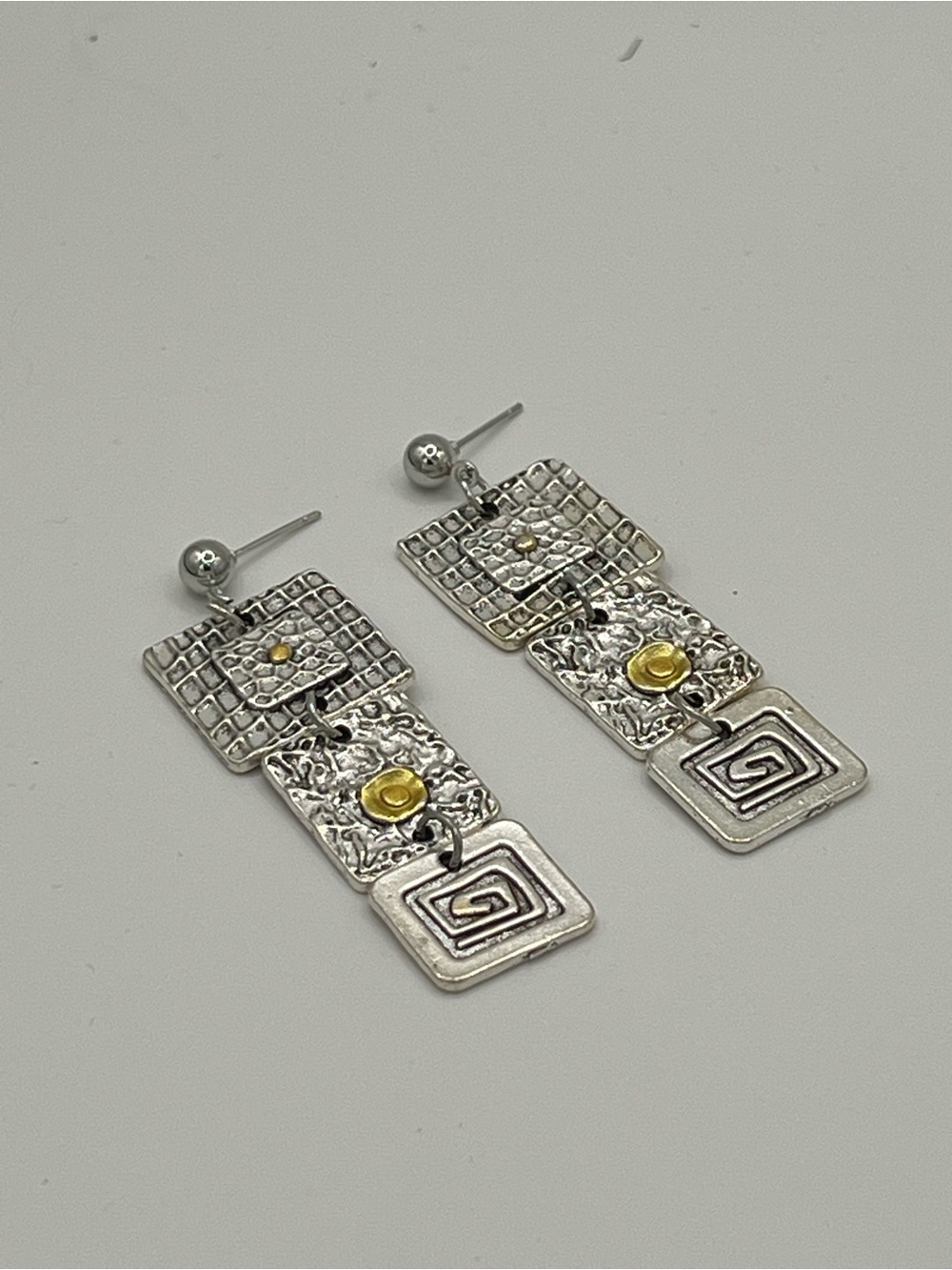 Silver Geometric Dangle Earrings with Gold Accents